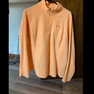 Orange north face half zip fleece